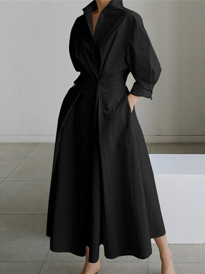 Elegant oversized V-ringad stilren långklänning