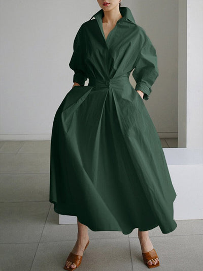 Elegant oversized V-ringad stilren långklänning